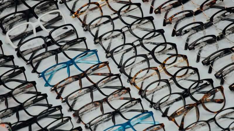 A collection of stylish eyeglasses frames in various shapes and colors, designed for both men and women, offering comfort, durability, and a perfect fit for all face types.