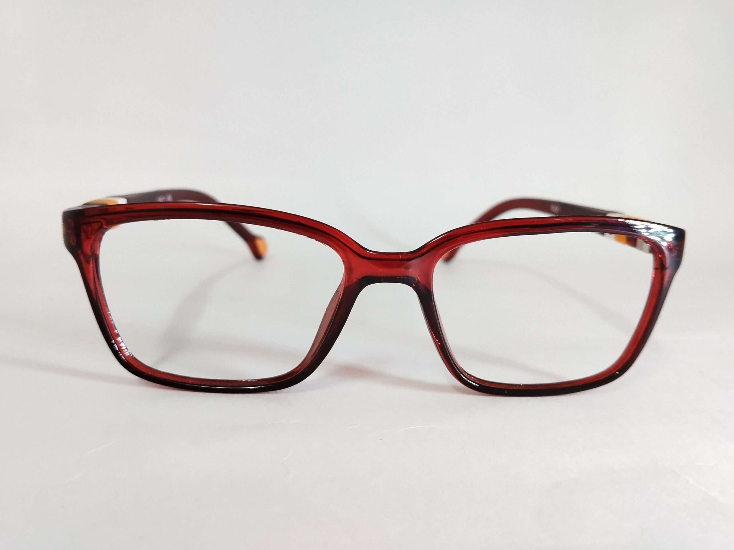 Blue ray protection glasses for kids in a stylish brown and orange frame, designed for comfort and eye safety during screen time