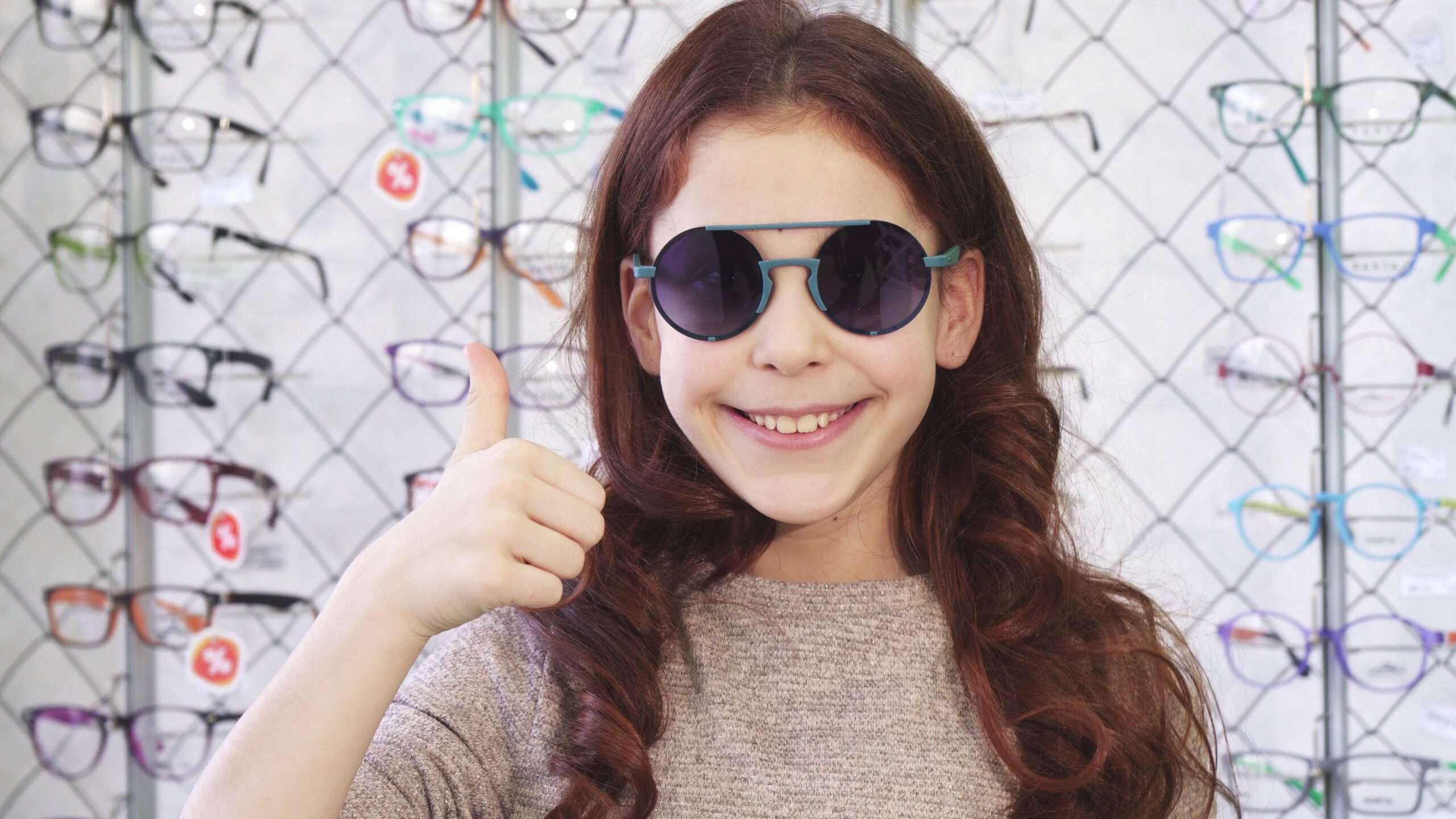“Close-up of durable kids eyeglasses frames in vibrant colors on display”