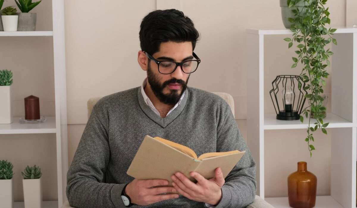 An assortment of stylish men reading glasses arranged on a table, ideal for choosing the best reading glasses for presbyopia and close-up tasks.