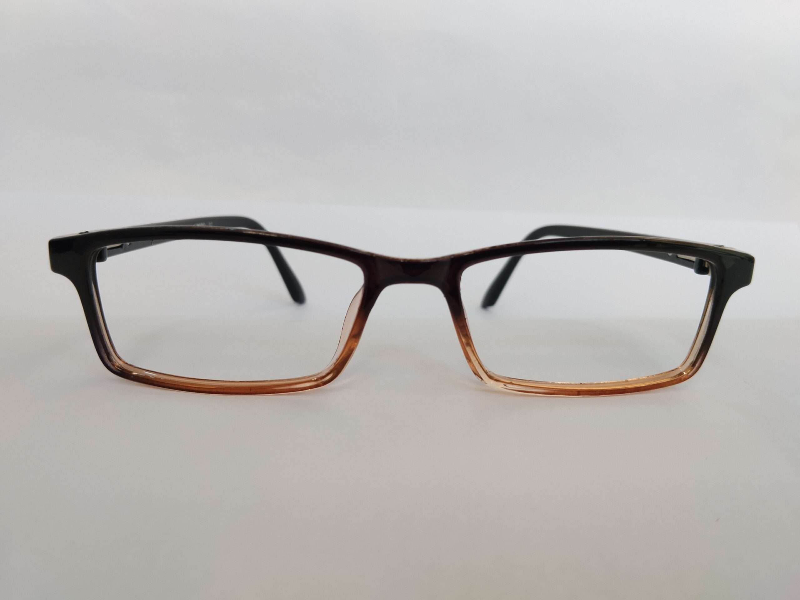 Black brown shade small rectangle shape glasses frames with compact modern dual-tone design