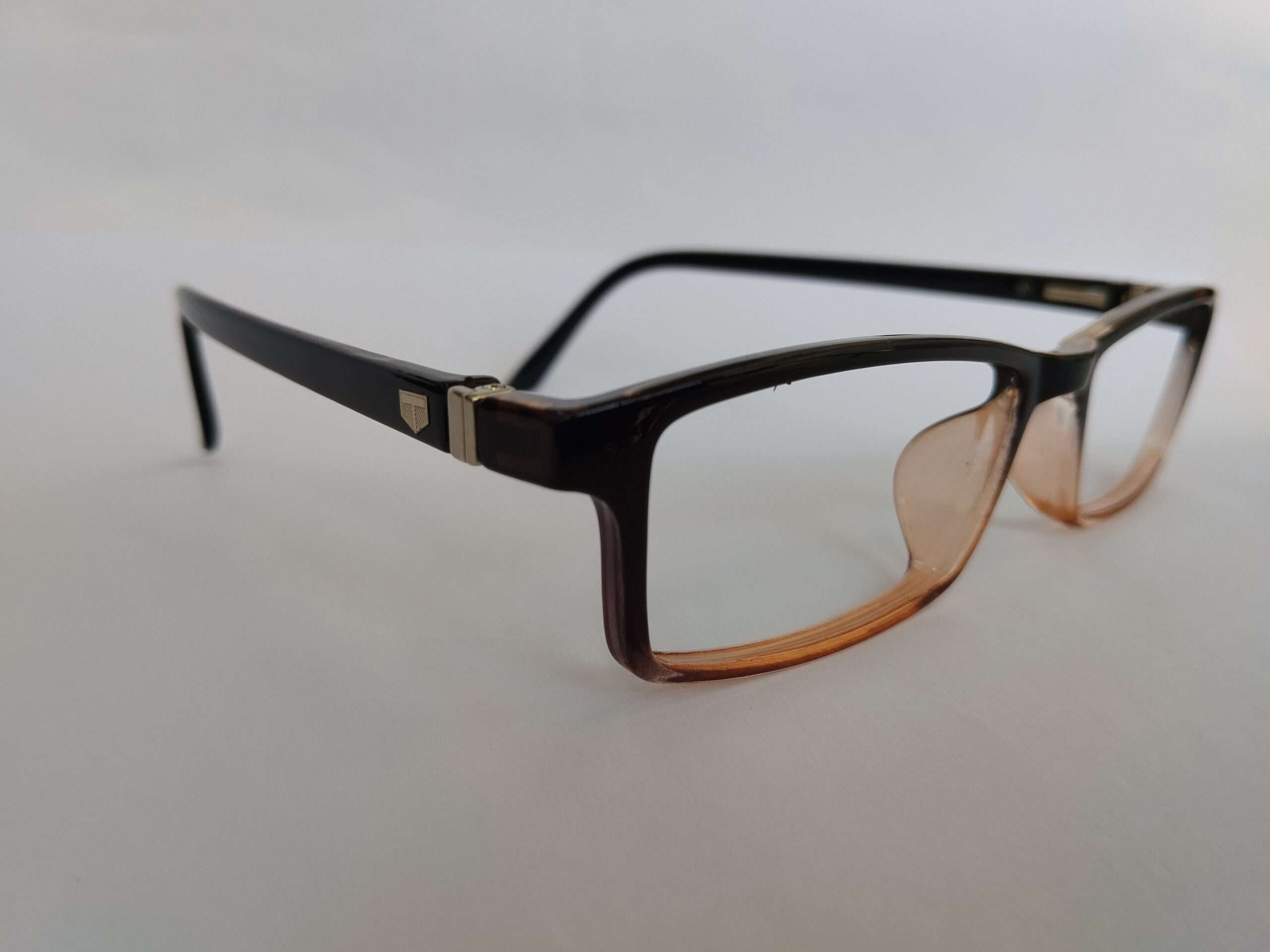 Black brown shade small rectangle shape glasses frames with compact modern dual-tone design