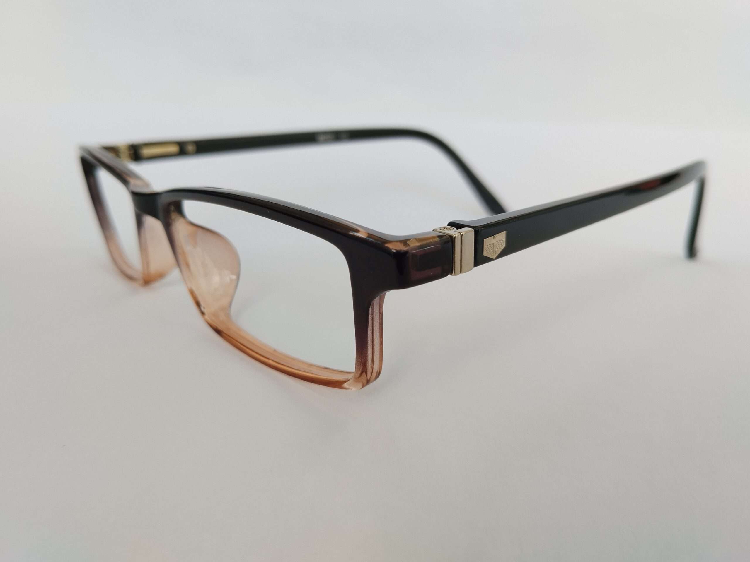 Black brown shade small rectangle shape glasses frames with compact modern dual-tone design