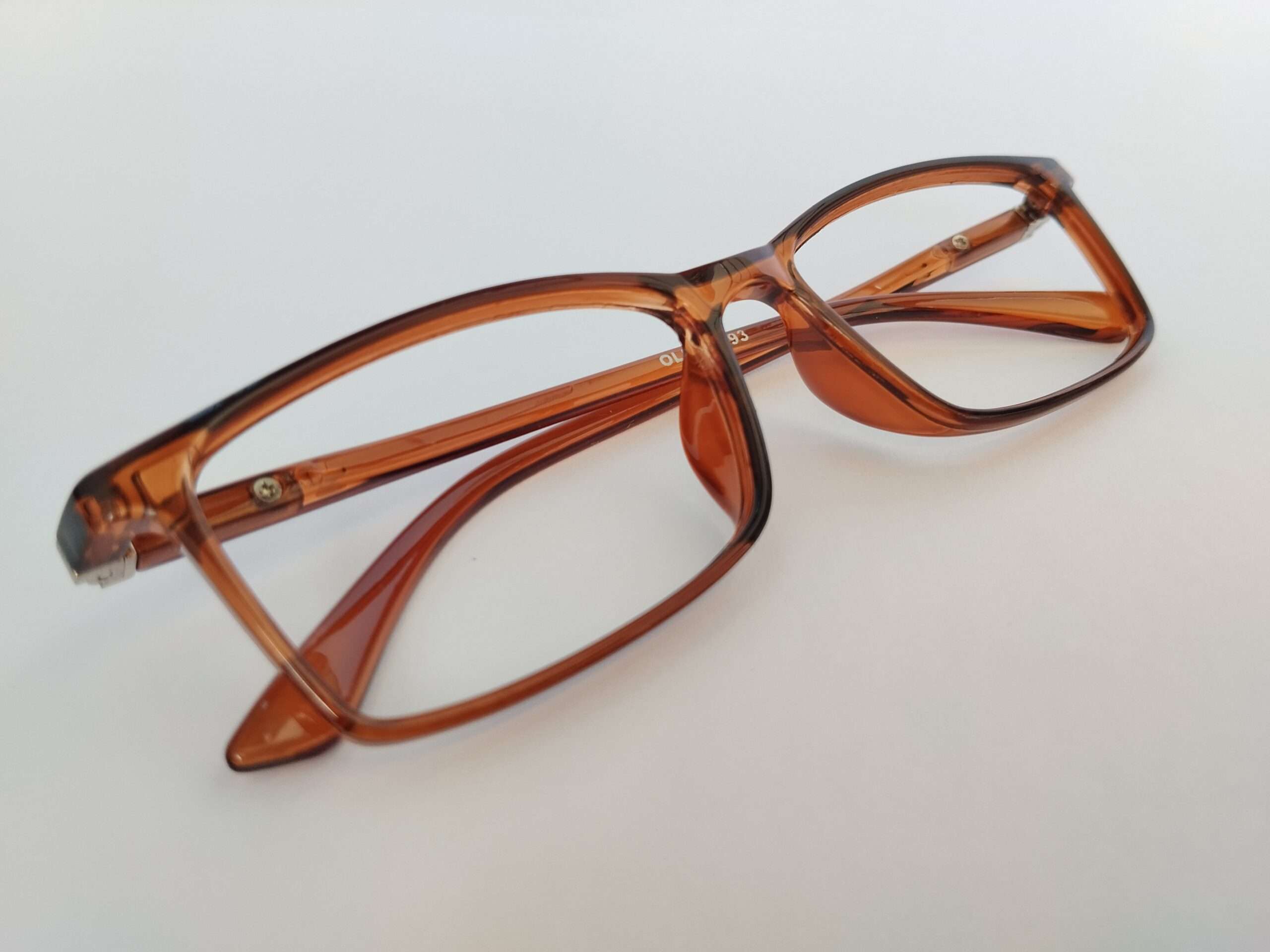 Rectangle brown frame eyeglasses with warm-tone design and lightweight modern frame