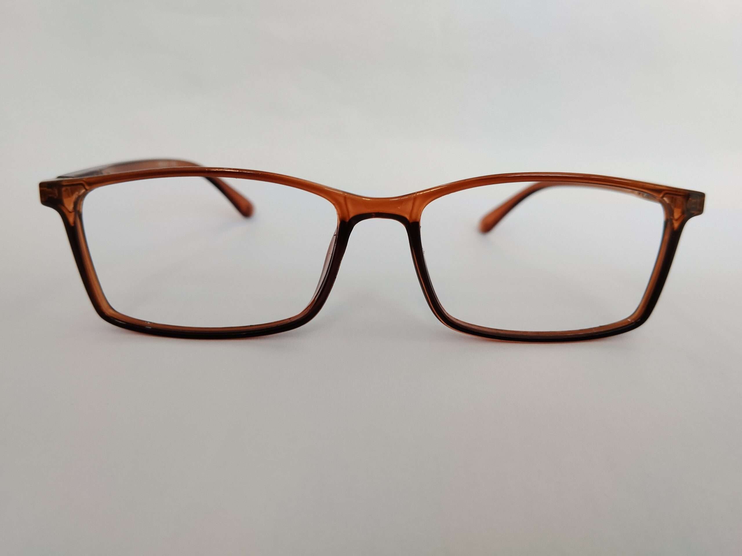 Rectangle brown frame eyeglasses with warm-tone design and lightweight modern frame