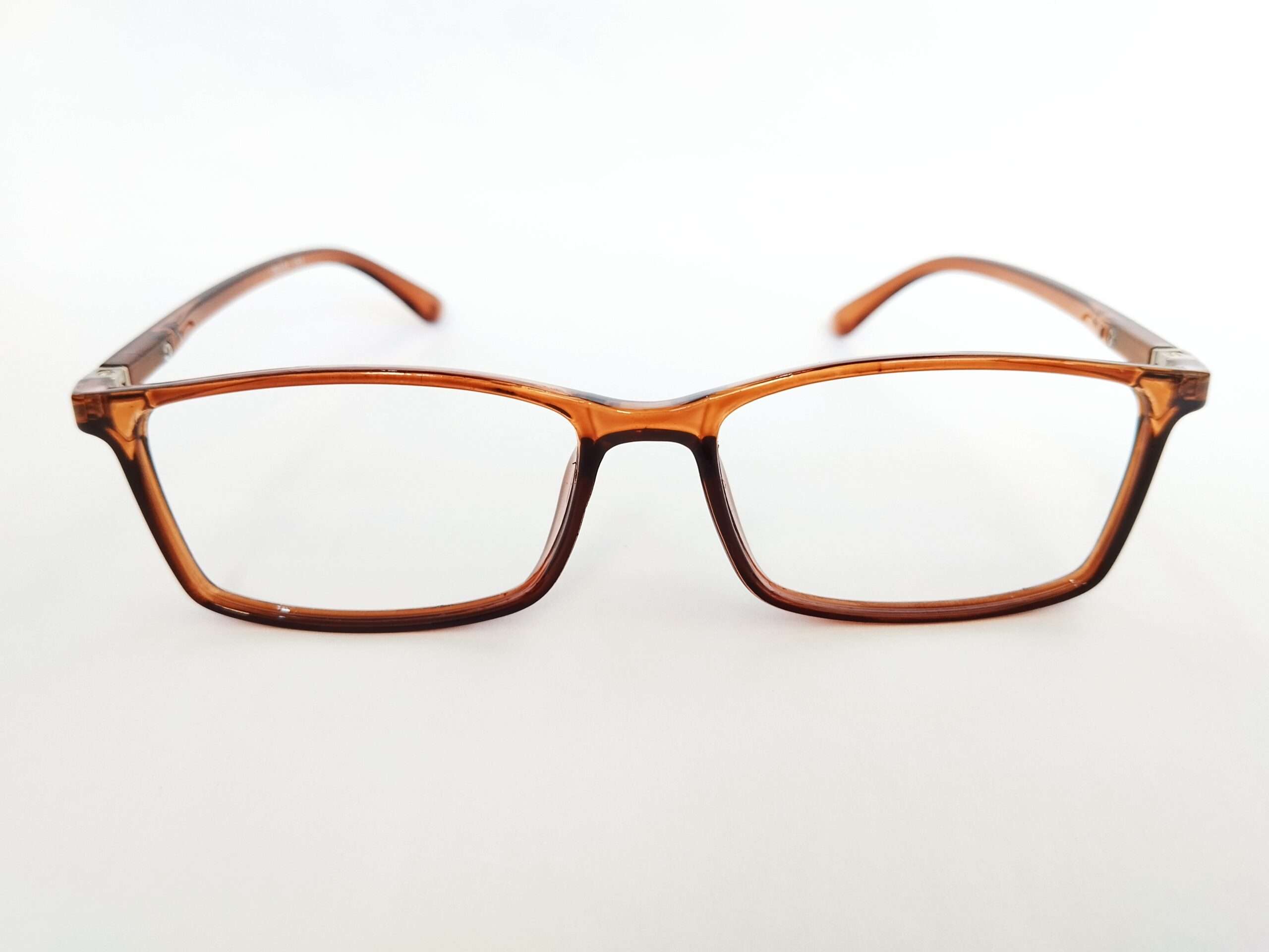 Rectangle brown frame eyeglasses with warm-tone design and lightweight modern frame