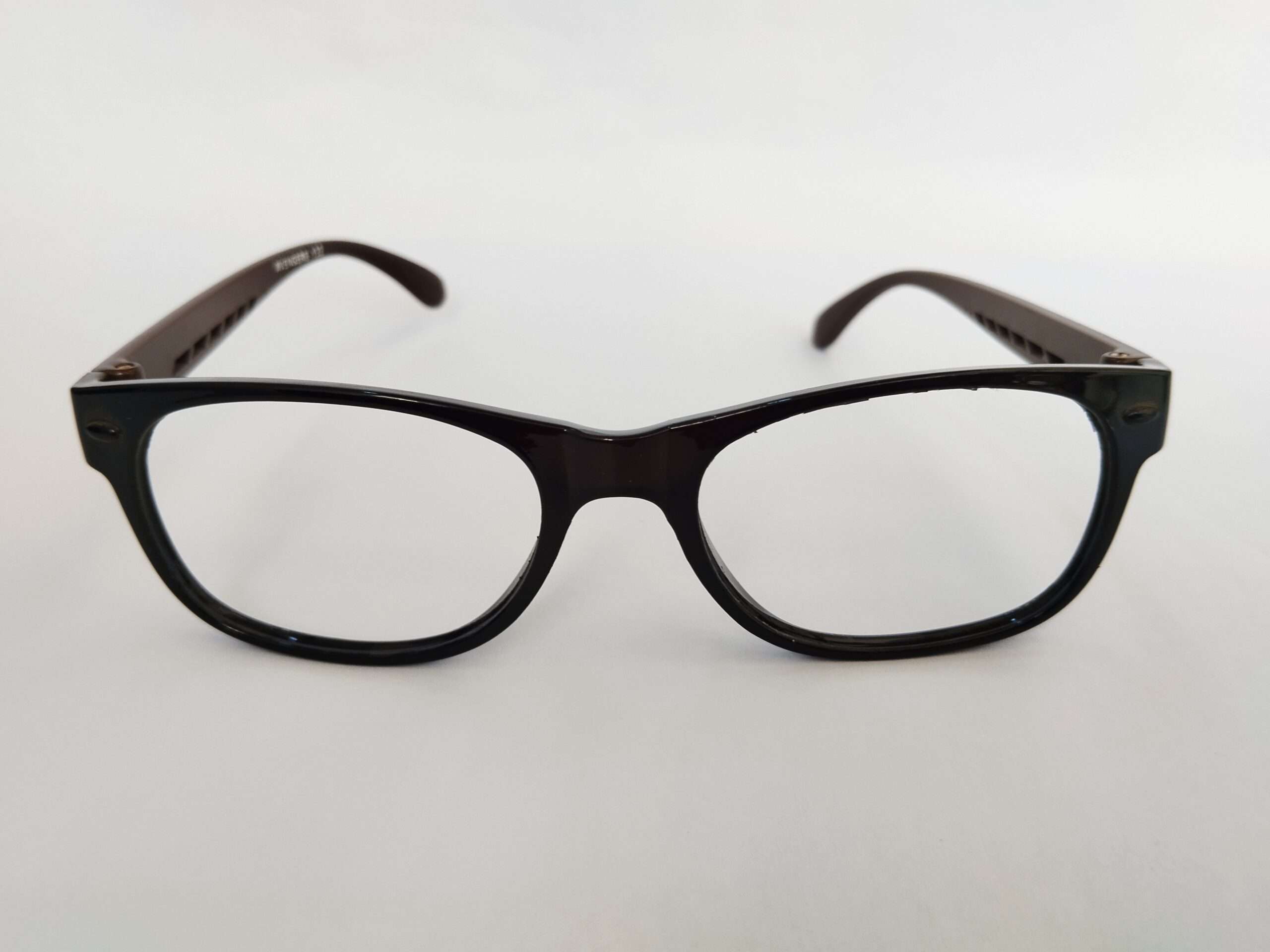 Black brown rectangle shape spectacles frames with dual-tone design and modern lightweight build