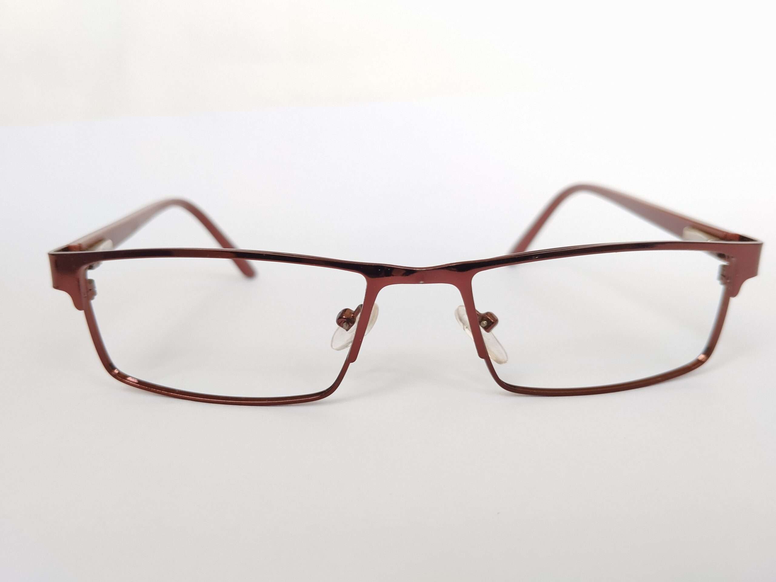 Copper Red Reading Glasses featuring a vibrant copper-red frame, sleek shaping, and clear magnifying lenses designed for everyday reading comfort.