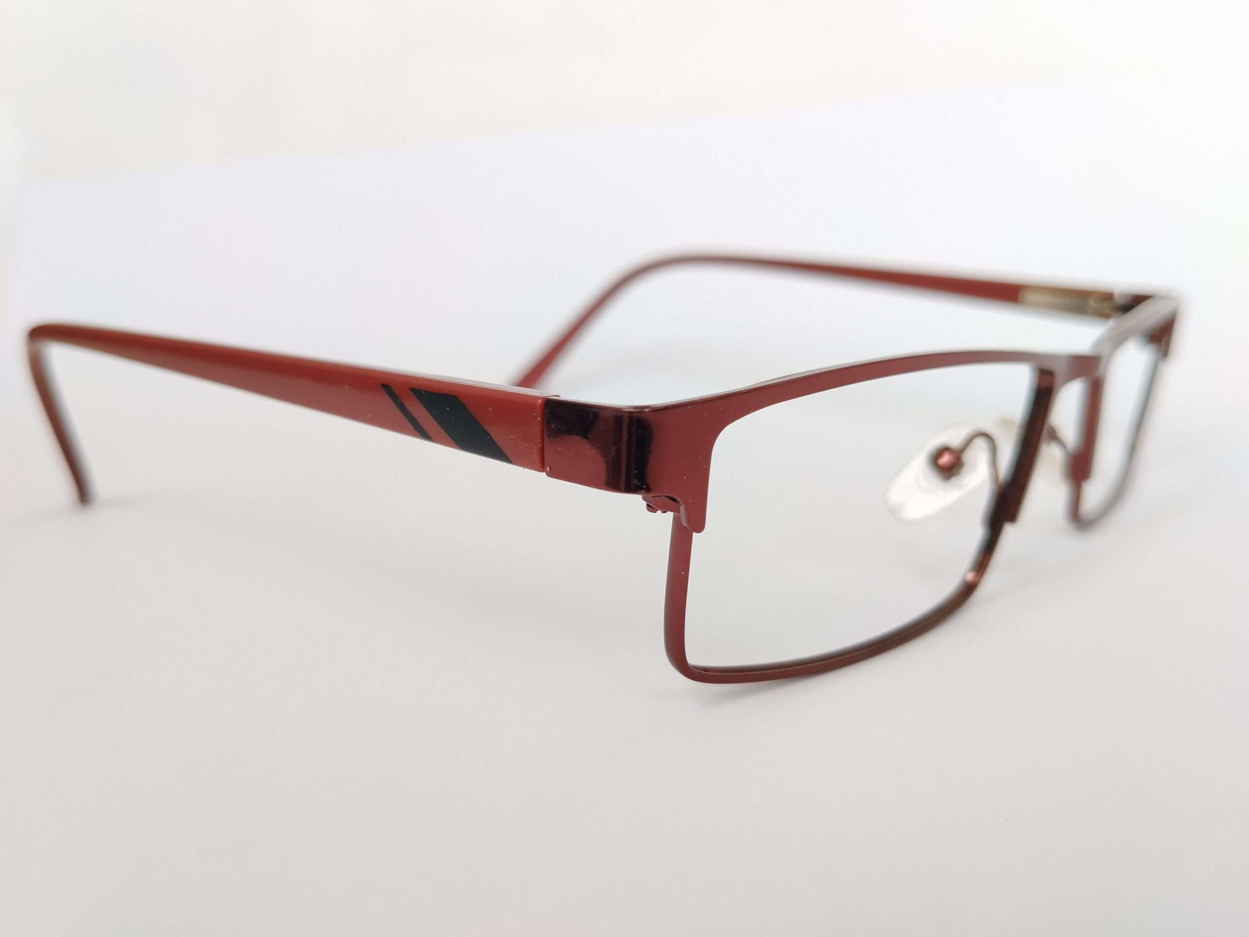 Copper Red Reading Glasses featuring a vibrant copper-red frame, sleek shaping, and clear magnifying lenses designed for everyday reading comfort.