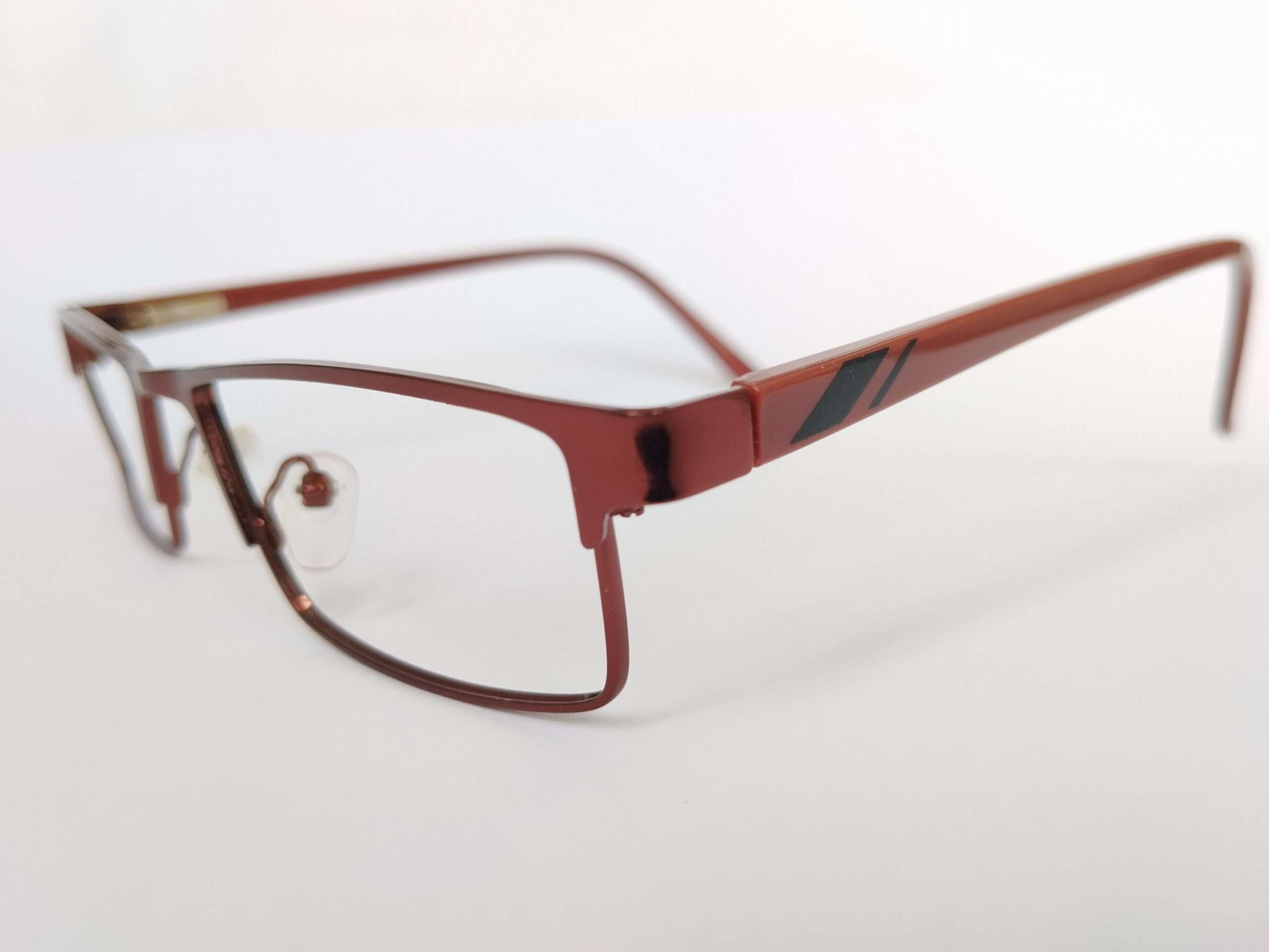 Copper Red Reading Glasses featuring a vibrant copper-red frame, sleek shaping, and clear magnifying lenses designed for everyday reading comfort.