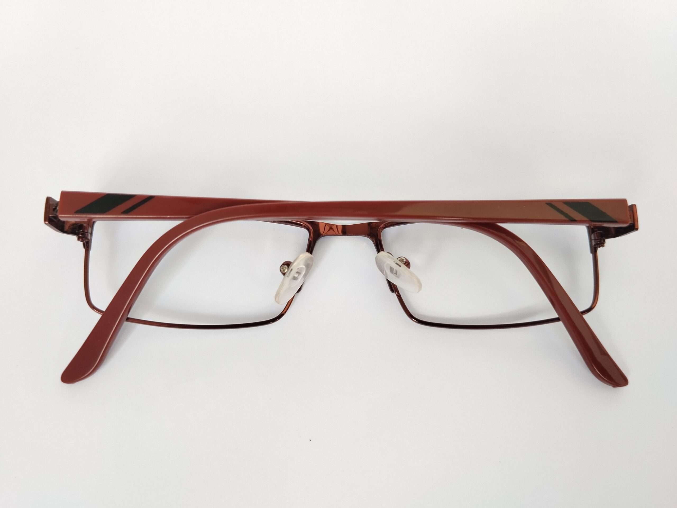 Copper Red Reading Glasses featuring a vibrant copper-red frame, sleek shaping, and clear magnifying lenses designed for everyday reading comfort.