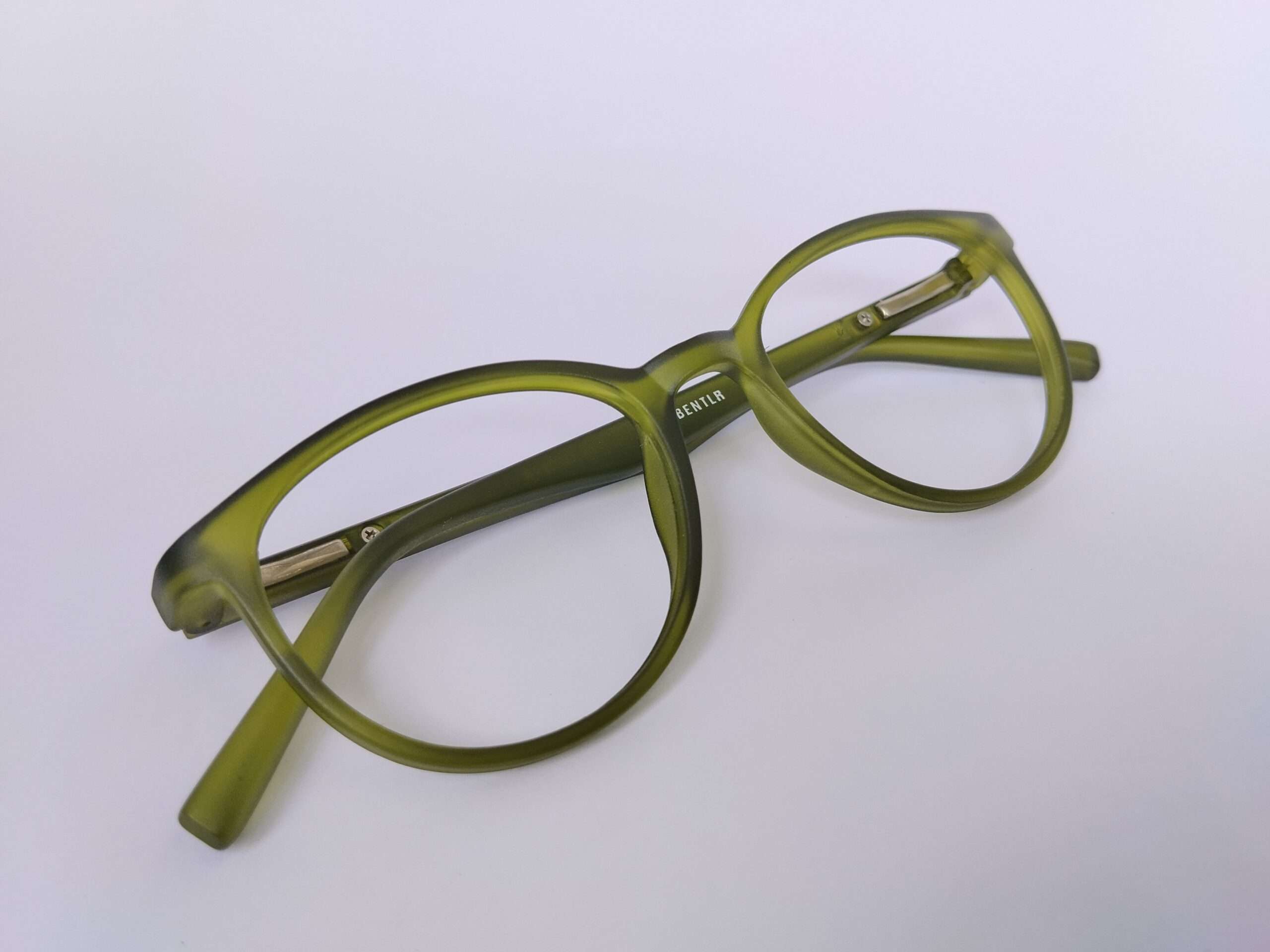 Olive Green Reading Glasses featuring a lightweight olive-green frame, smooth shaping, and clear Progressive glasses designed for daily reading comfort.