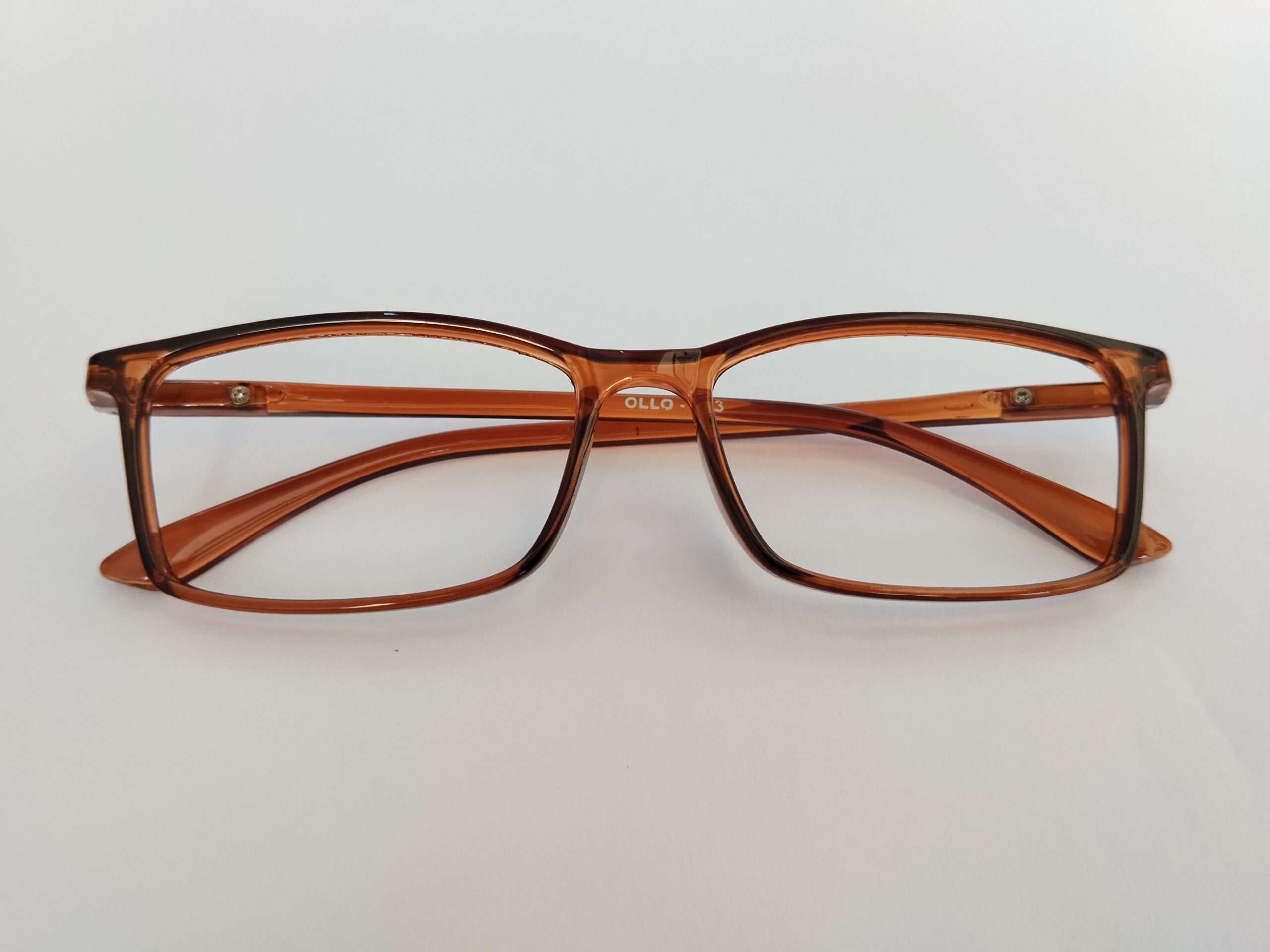 Brown rectangle pc glasses with slim modern frame and polished brown finish.