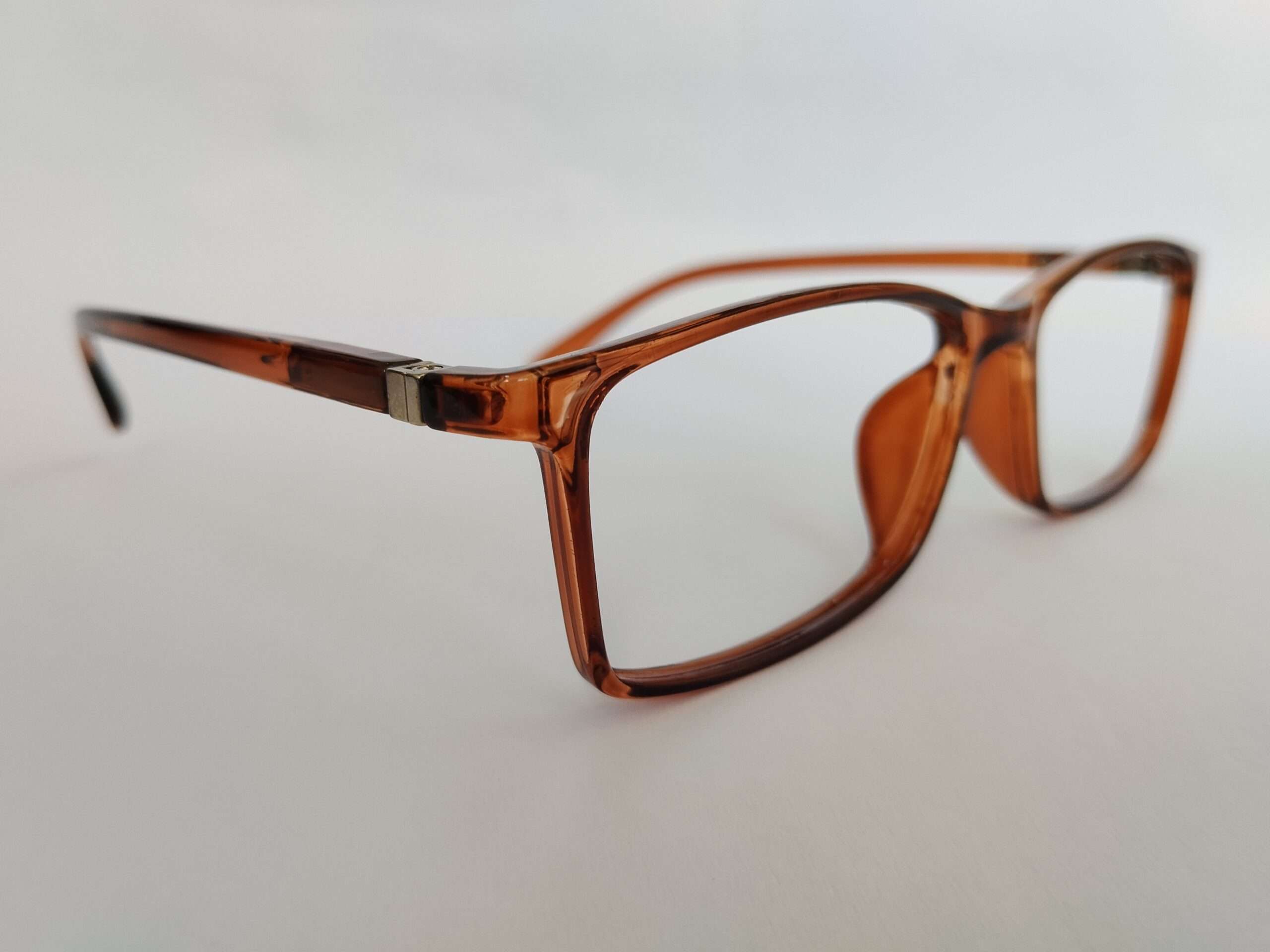 Brown rectangle reading glasses with warm tone and lightweight modern design