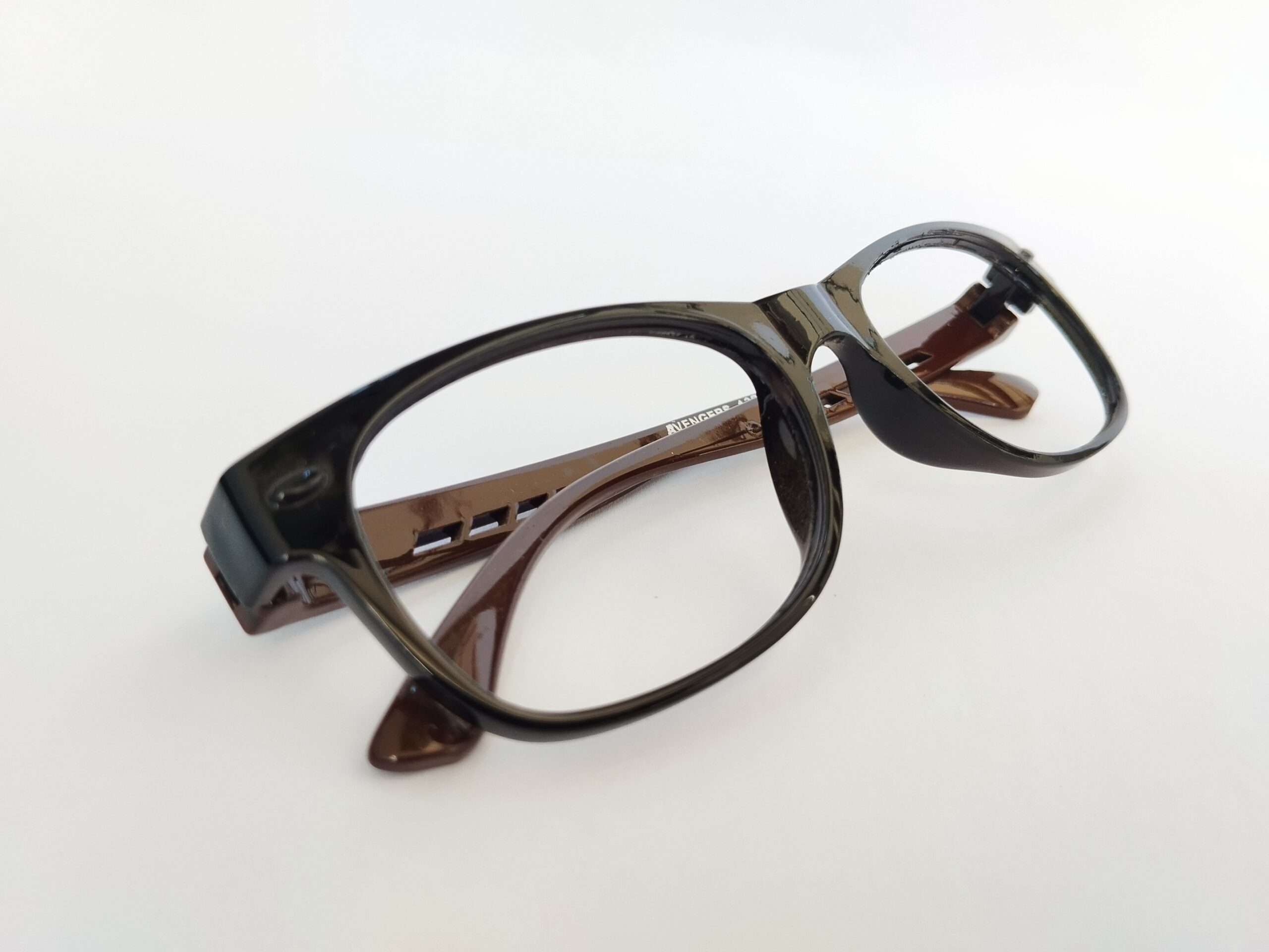 Black square frame glasses with brown dual-tone design and modern lightweight frame