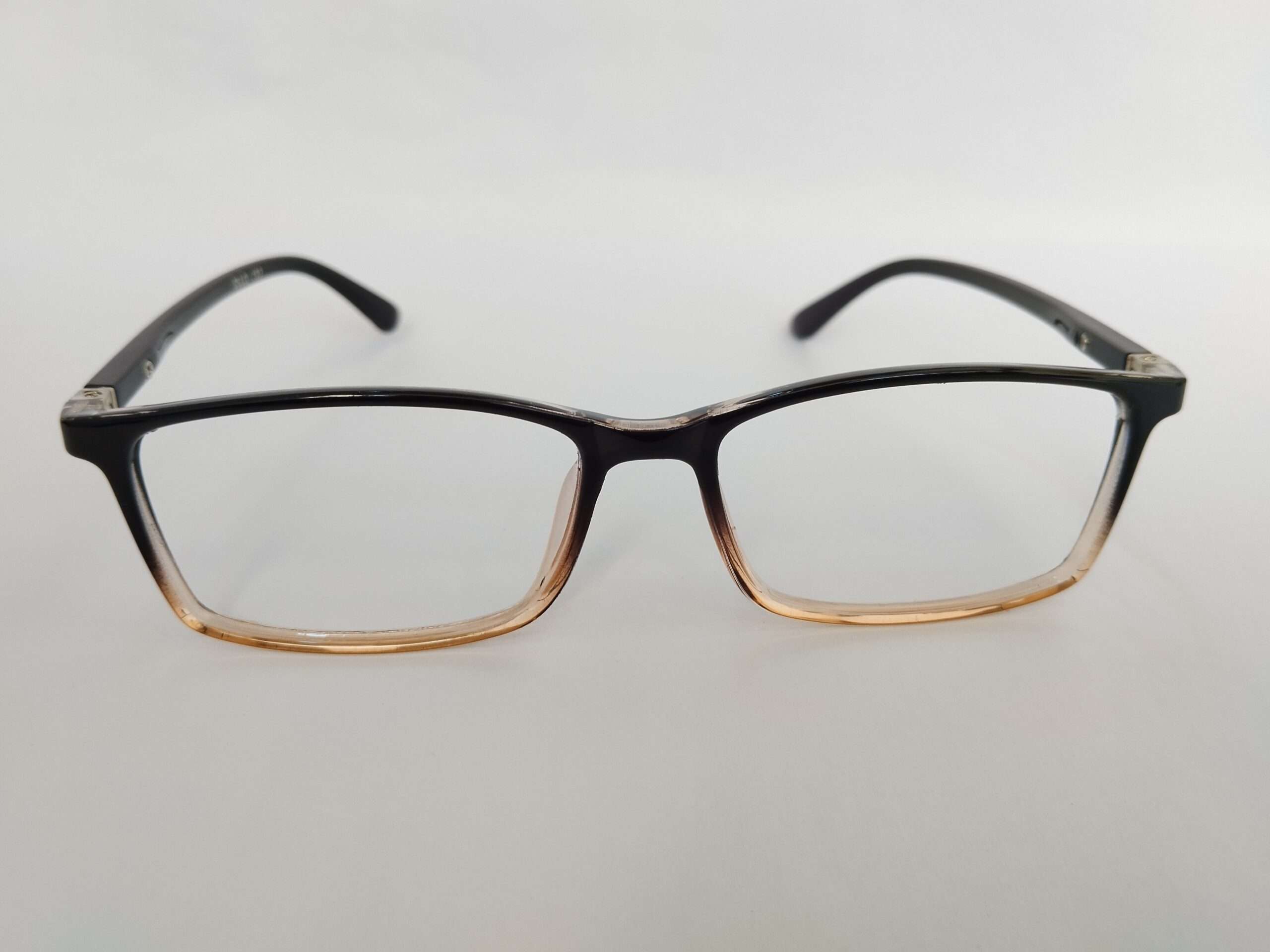 Black brown shade specs for computer glasses with sleek dual-tone frame and modern digital-friendly design.