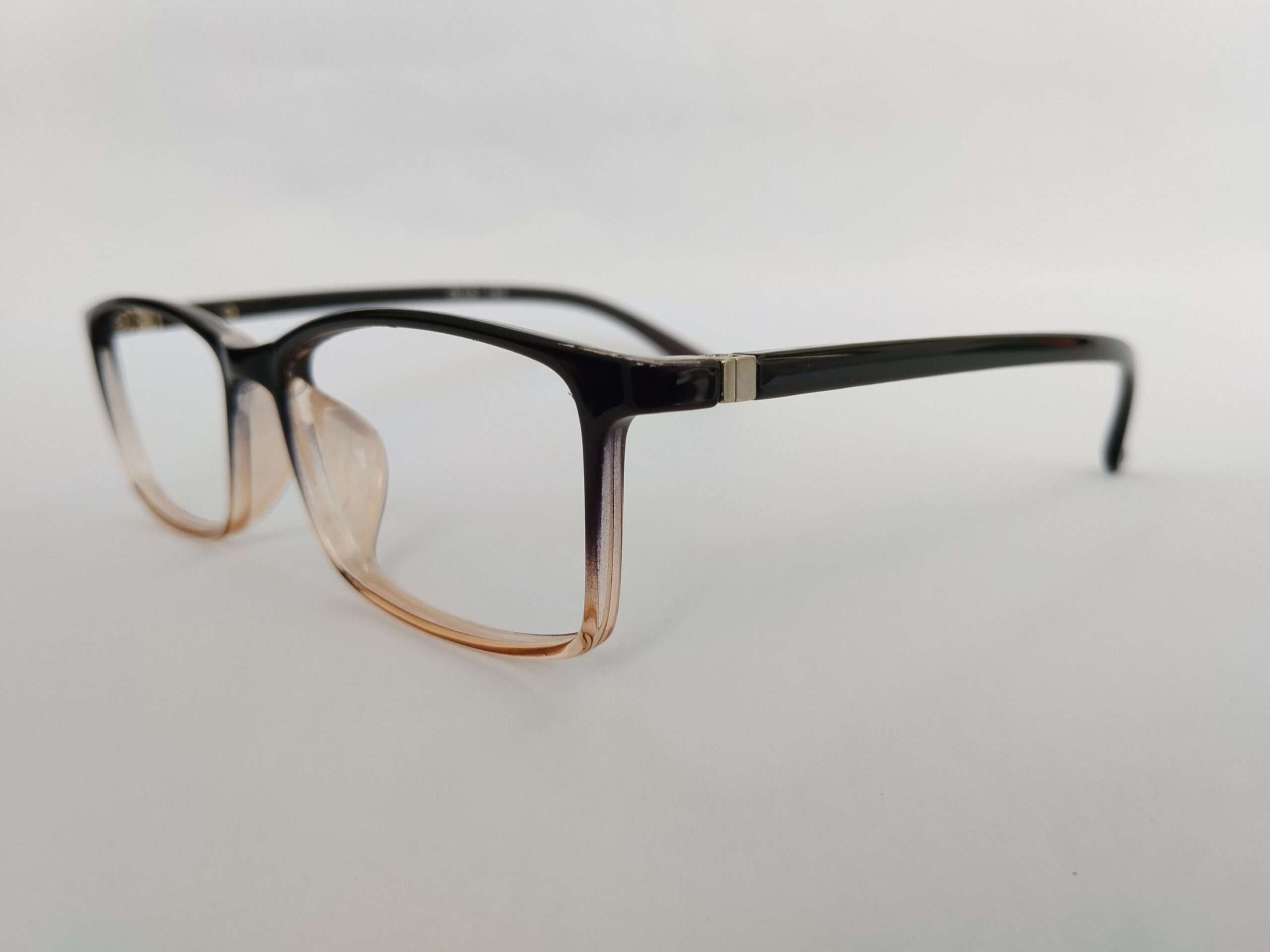Black brown shade specs for computer glasses with sleek dual-tone frame and modern digital-friendly design.