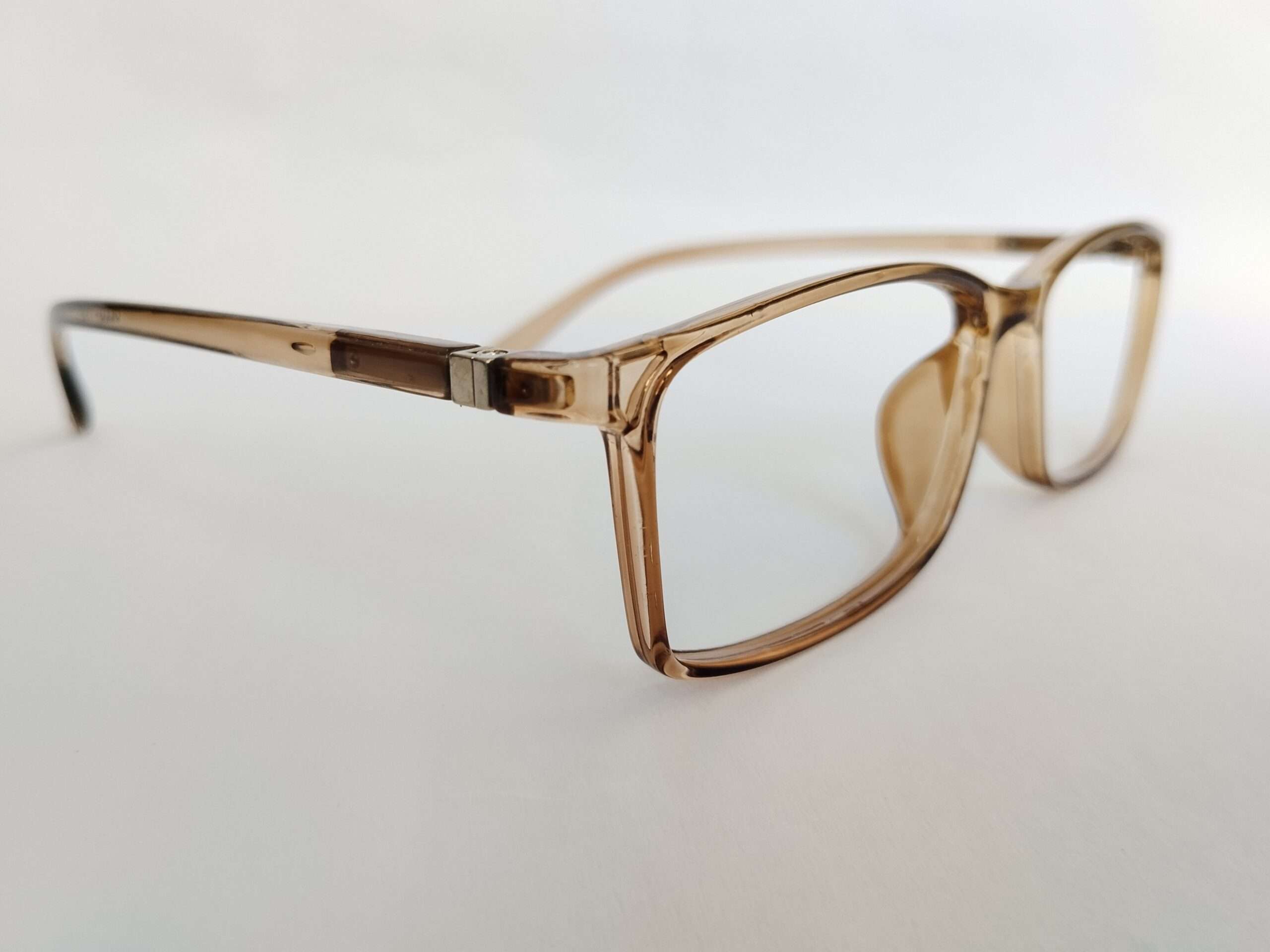 Light brown rectangle reading glasses with a slim, modern, lightweight frame.