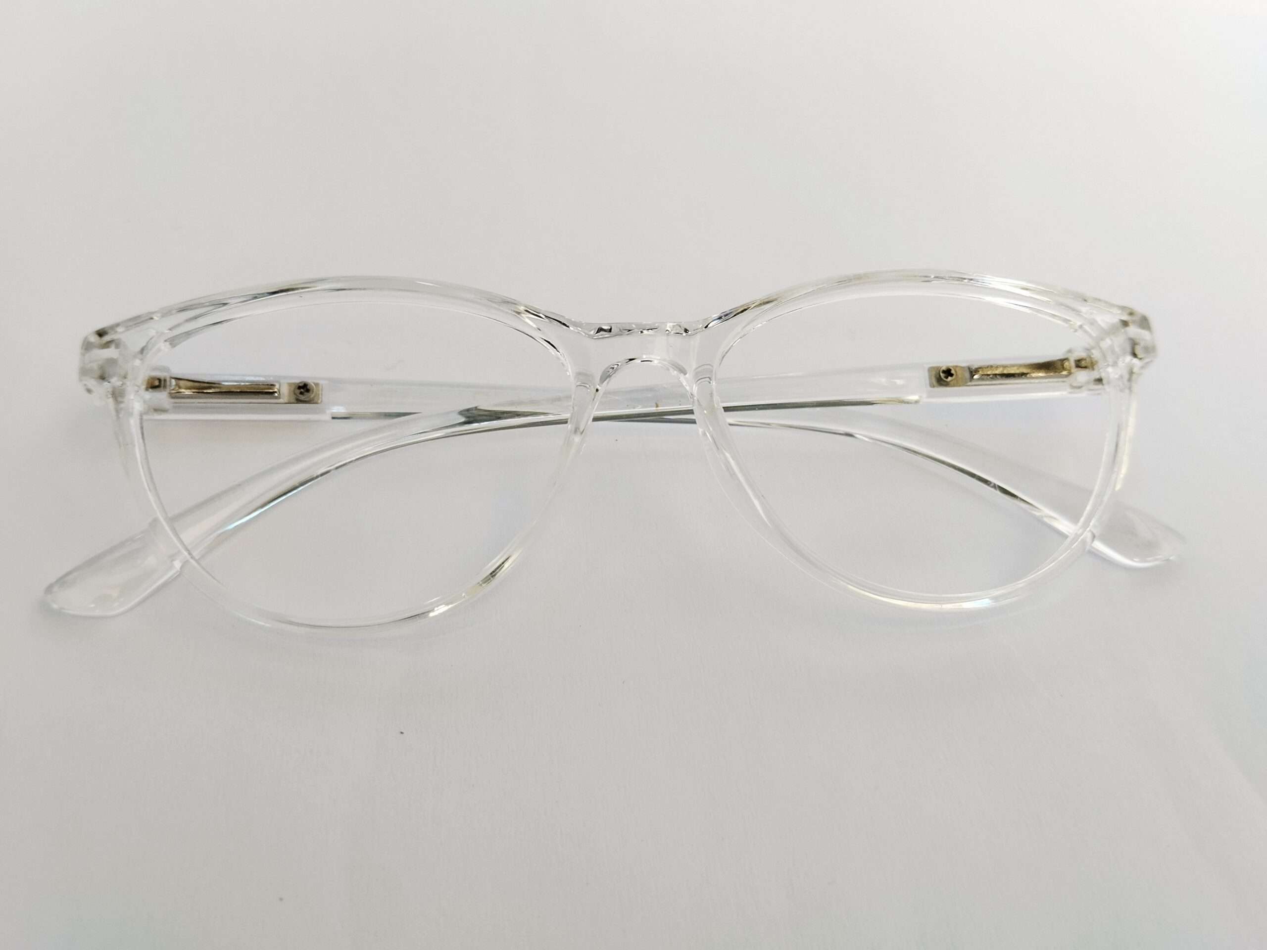 Crystal clear cat eye glasses for computer screen with transparent frame and modern digital-friendly design.