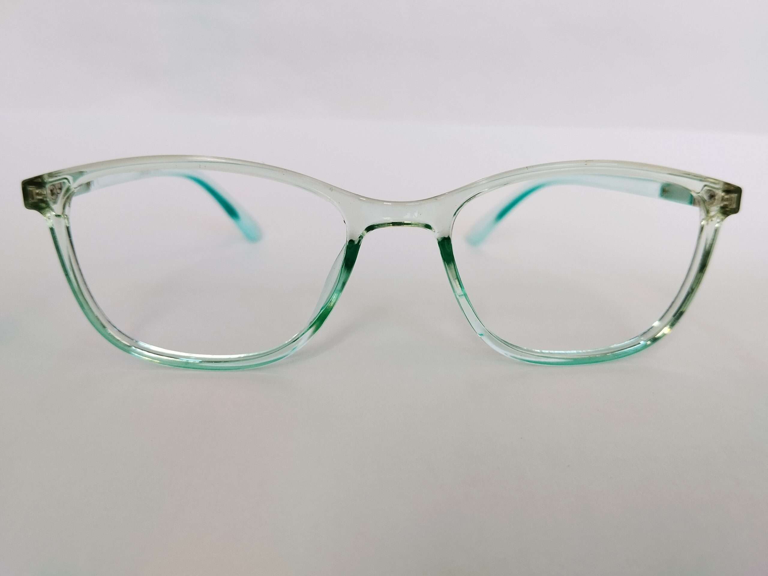 Sky blue computer rectangle glasses with modern slim frame and soft matte finish.
