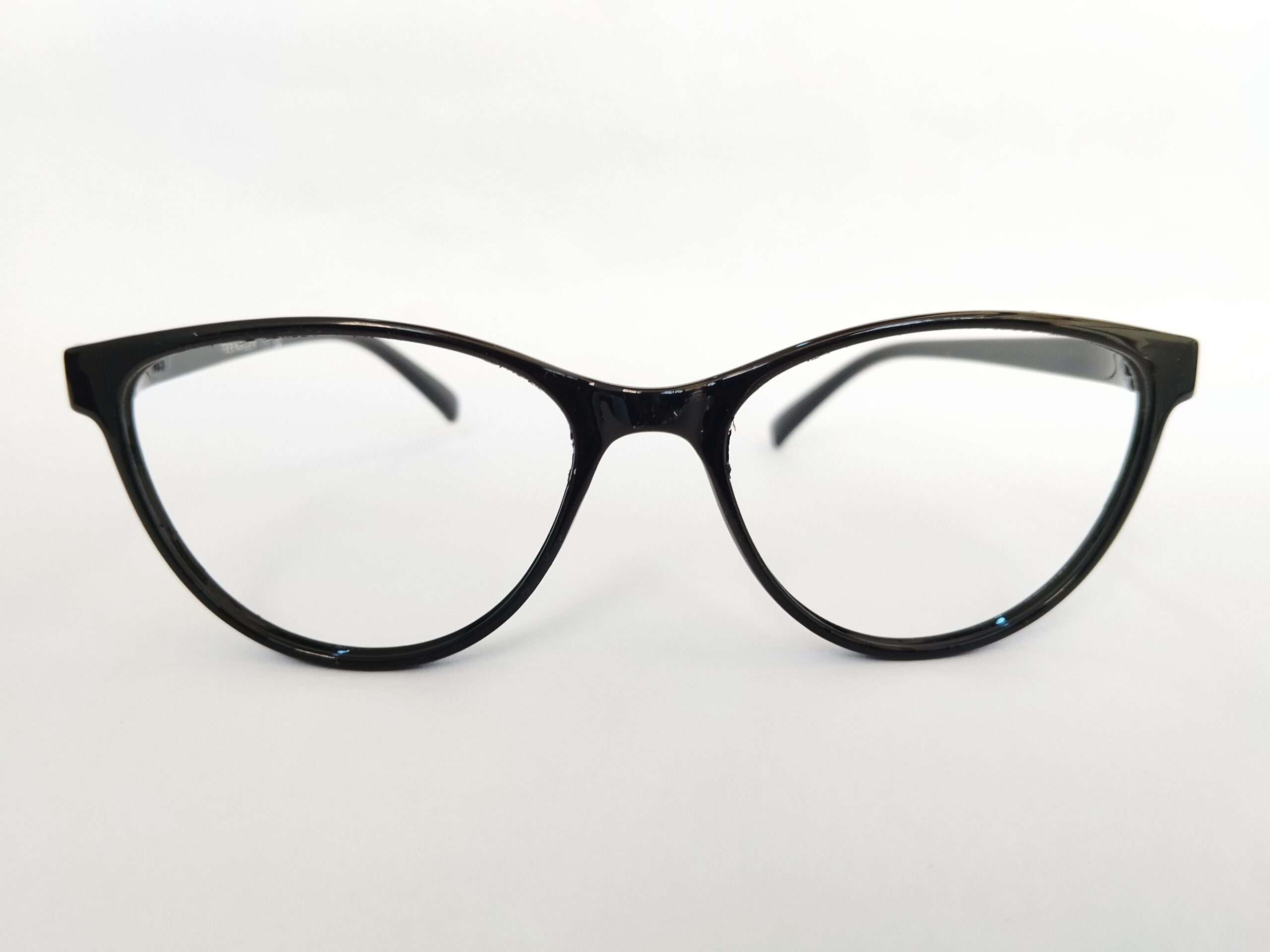 Black womens cat eye glasses with sharp upswept edges and modern glossy finish