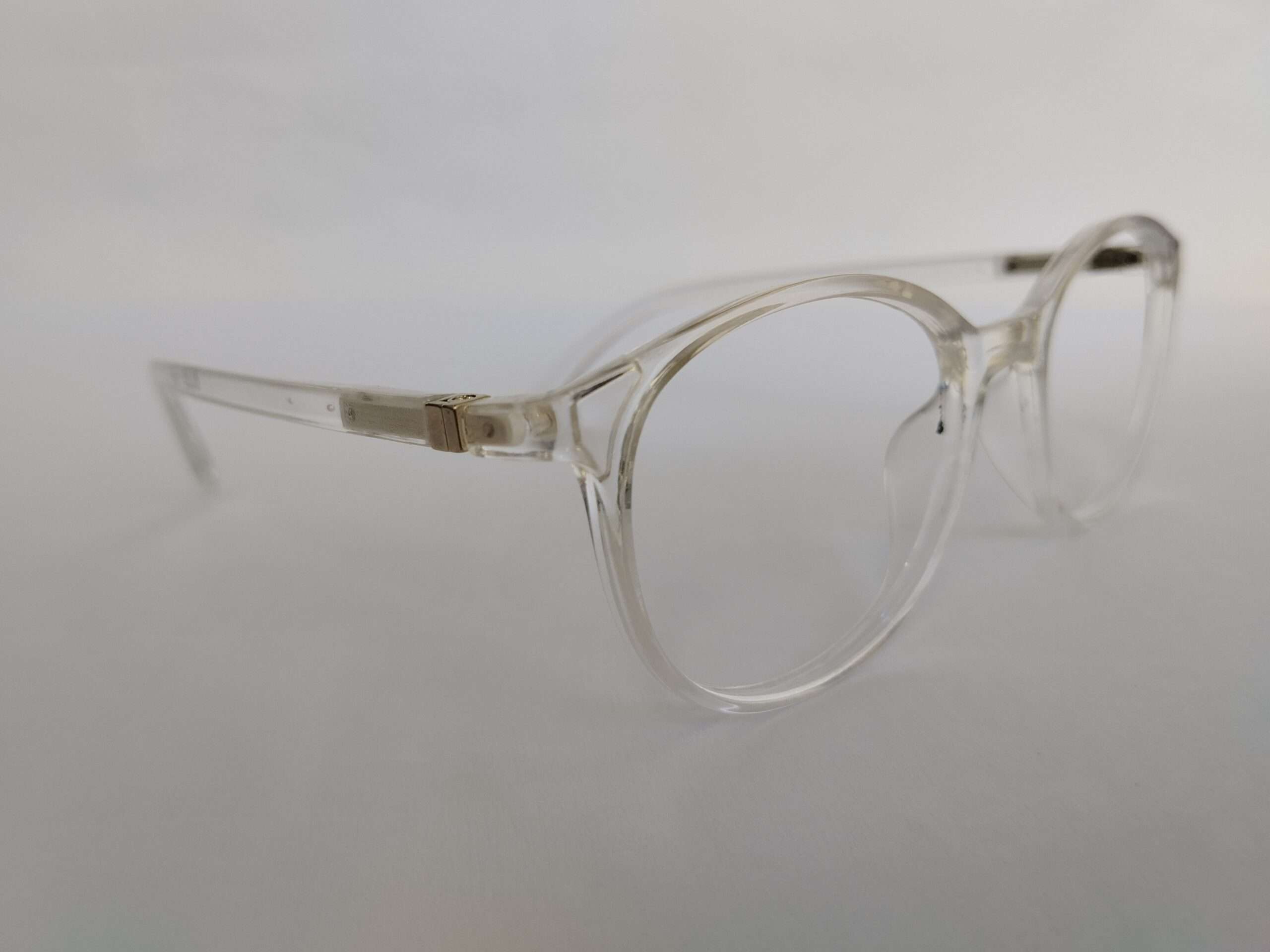 Crystal clear oval reading glasses with lightweight transparent frame design