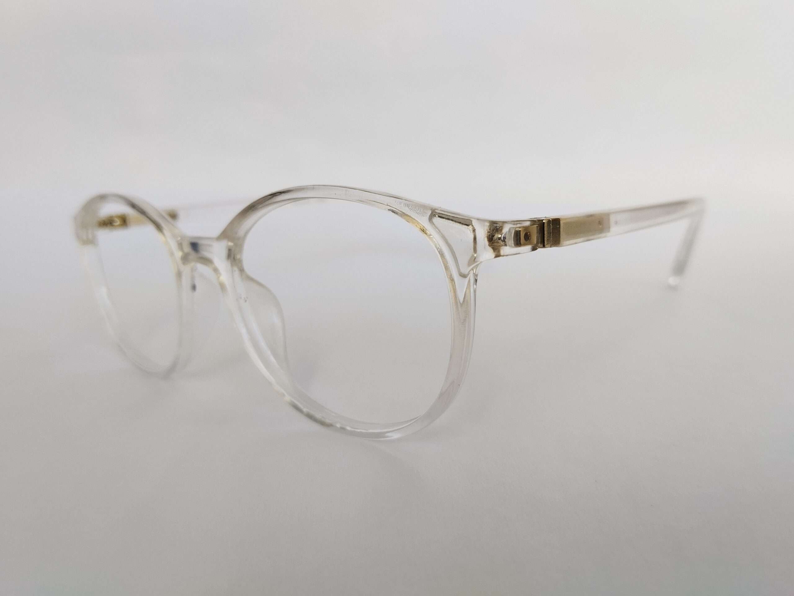 Crystal clear oval reading glasses with lightweight transparent frame design