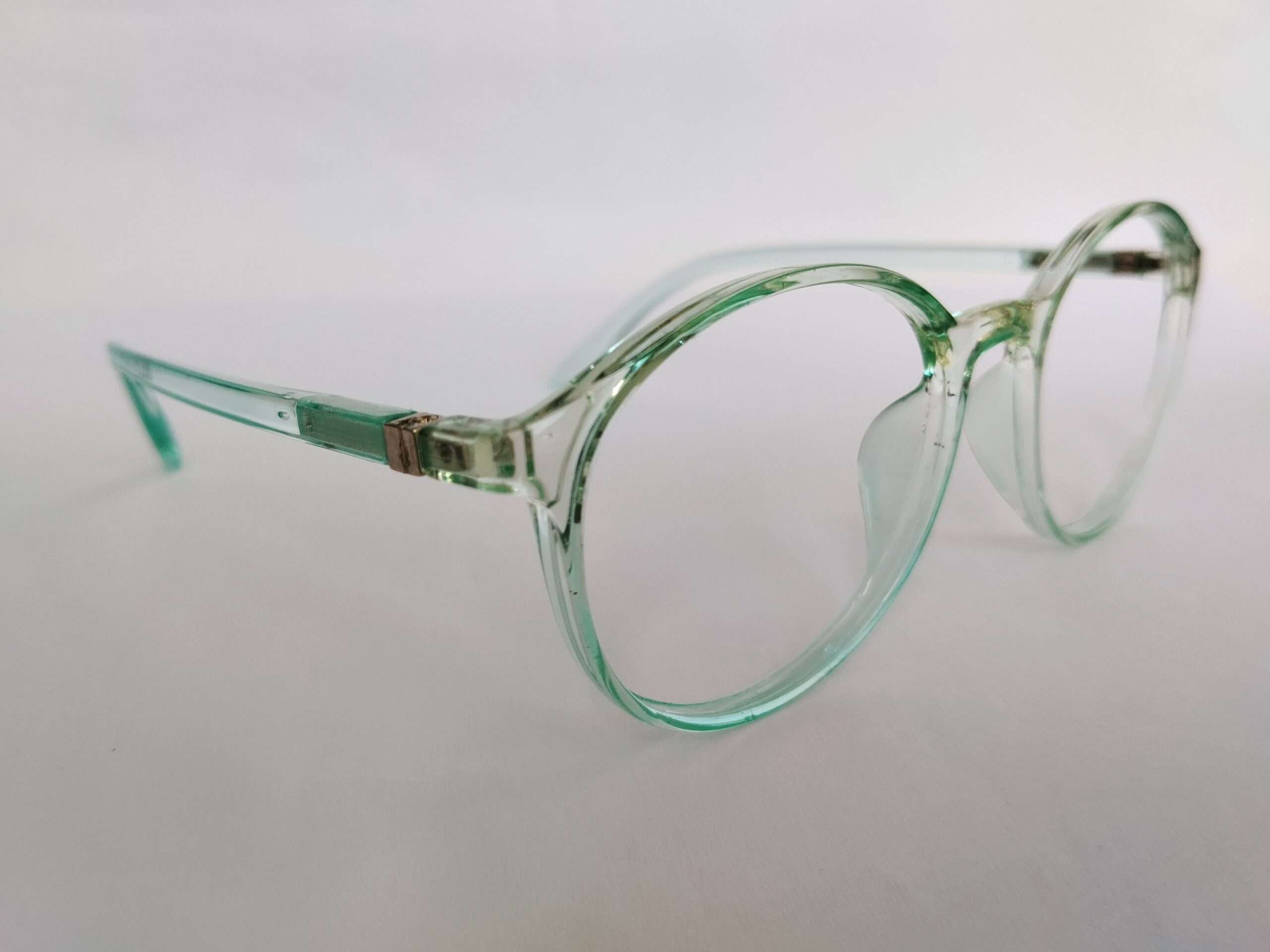 Sky blue computer oval glasses with a smooth lightweight frame and modern digital-friendly design.