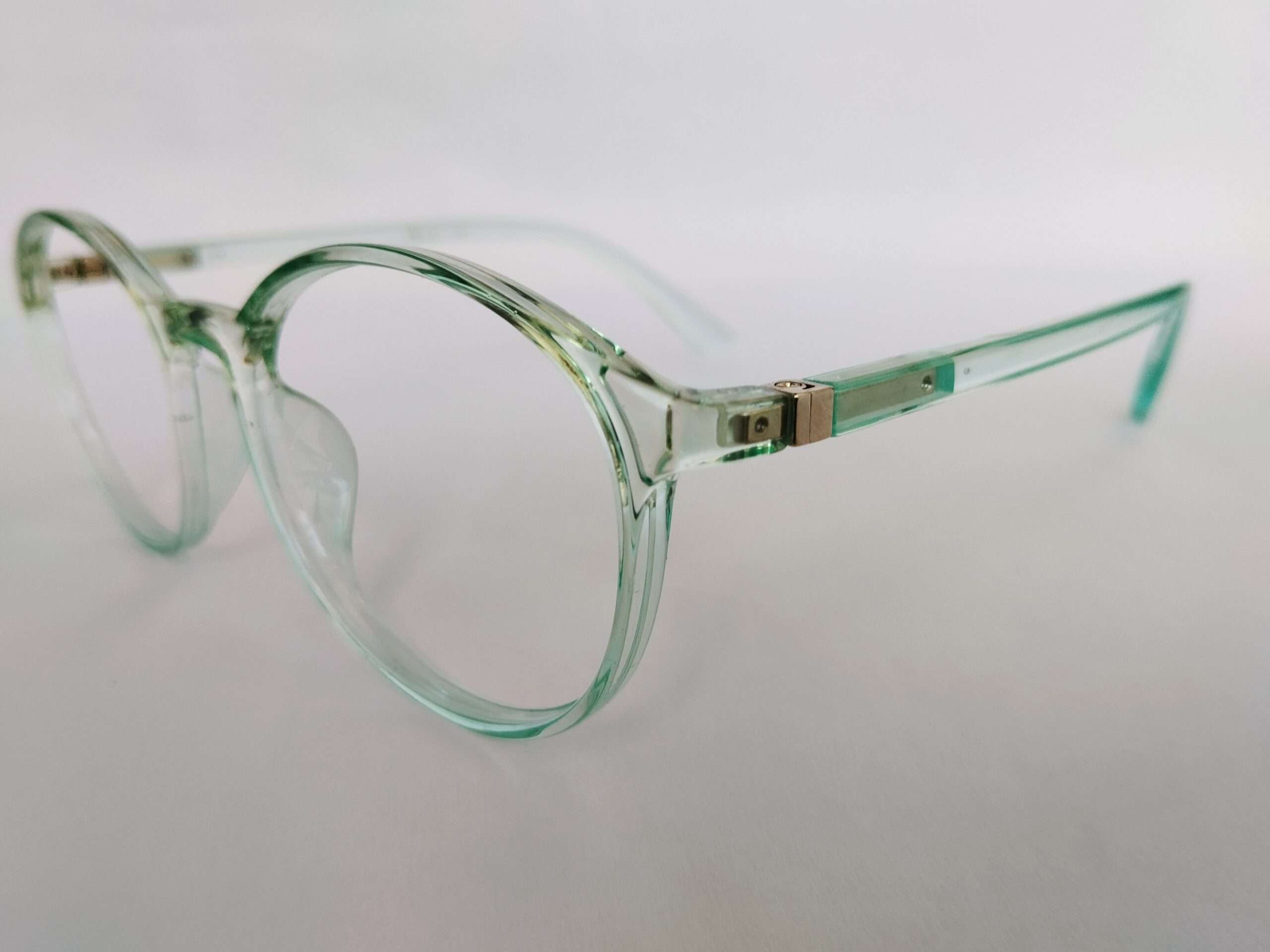 Sky blue computer oval glasses with a smooth lightweight frame and modern digital-friendly design.