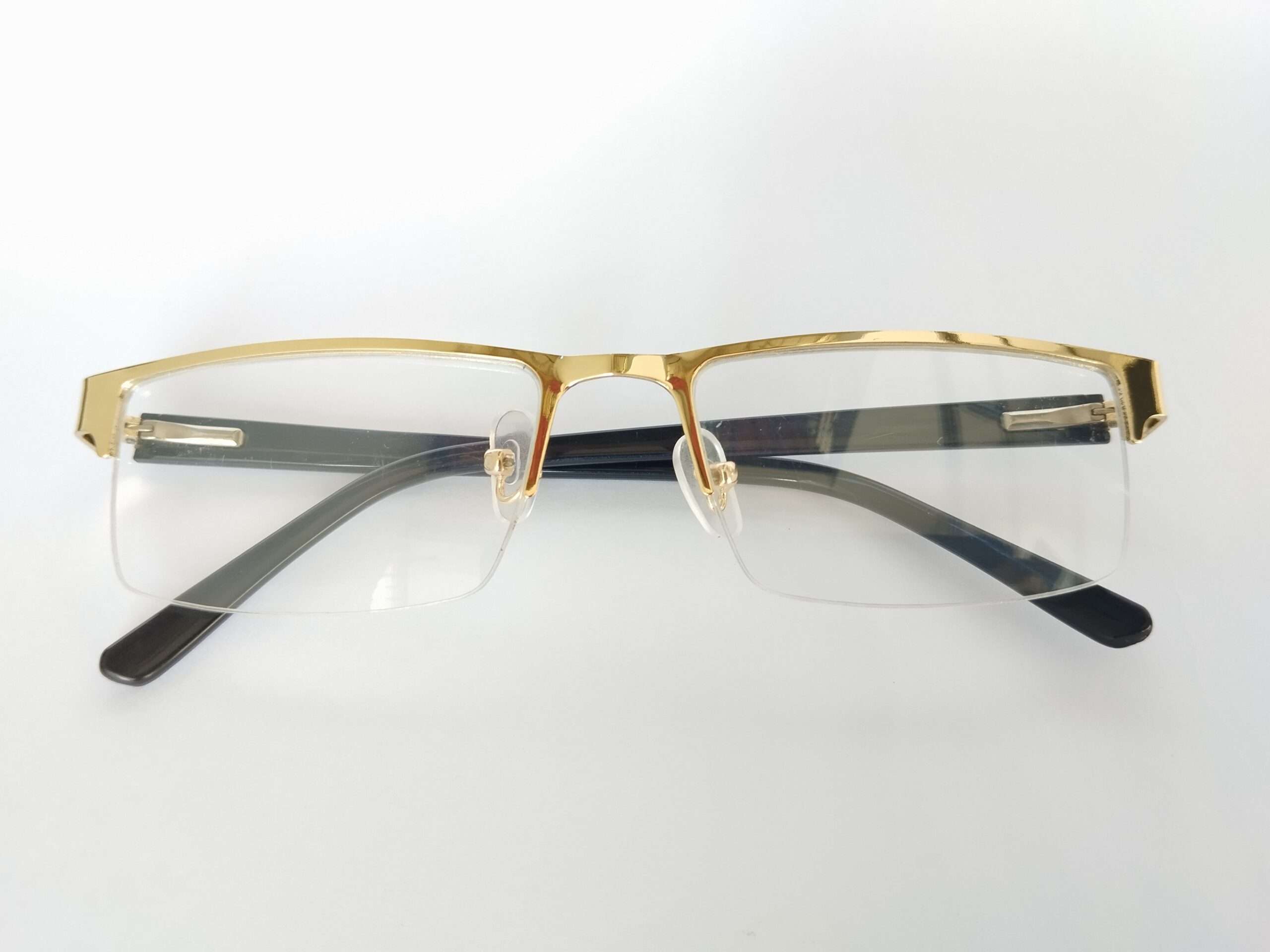 Premium gold eyeglass frames with stylish lightweight design for men and women