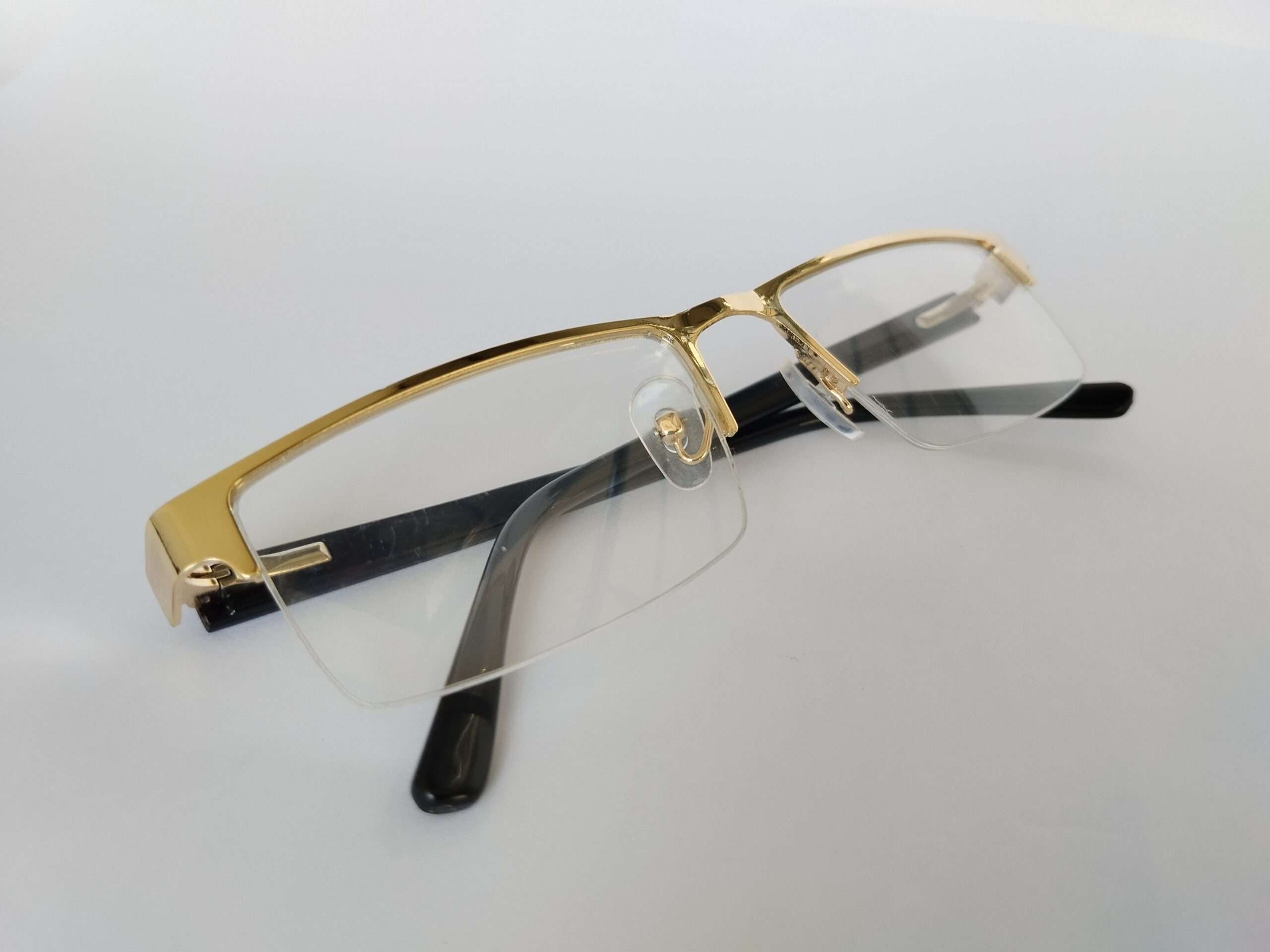 Premium gold eyeglass frames with stylish lightweight design for men and women