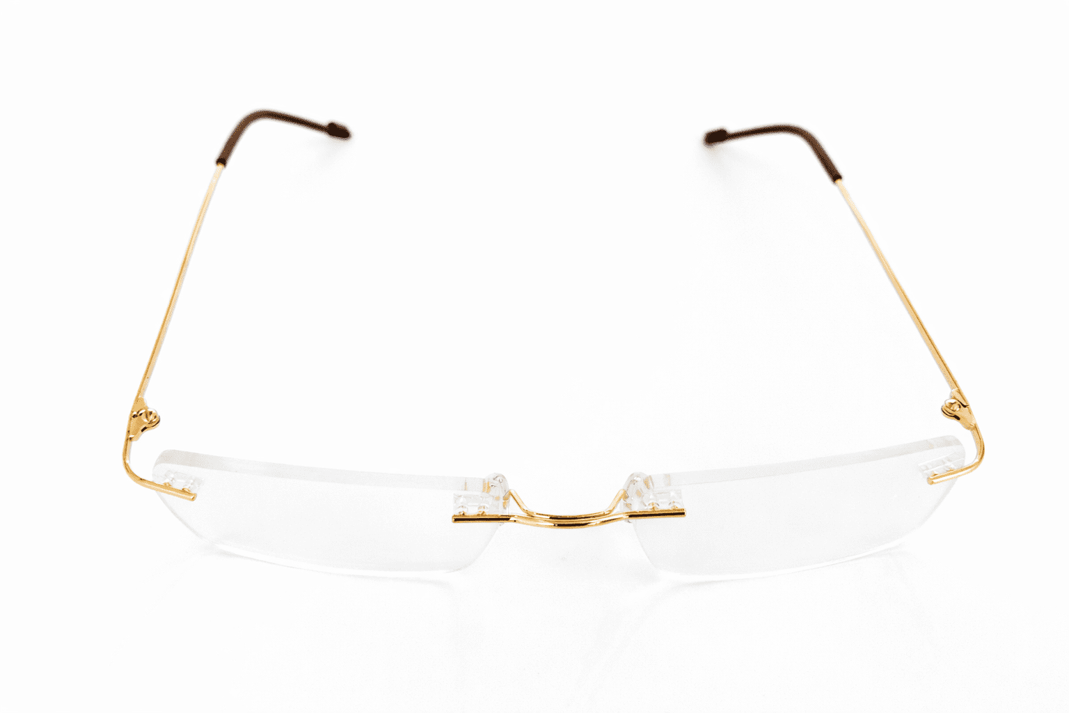 Elegant gold rimless eyeglasses with lightweight metal temples and premium comfortable fit for men and women
