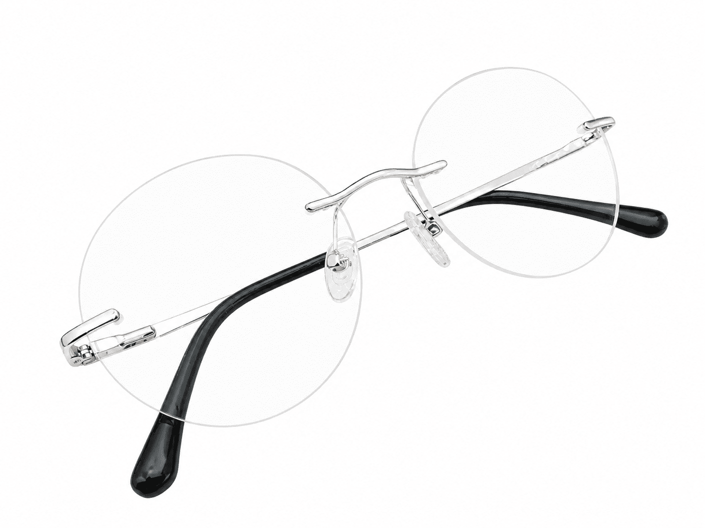 Soft edge silver black rimless round frames with lightweight design suitable for prescription lenses and everyday wear